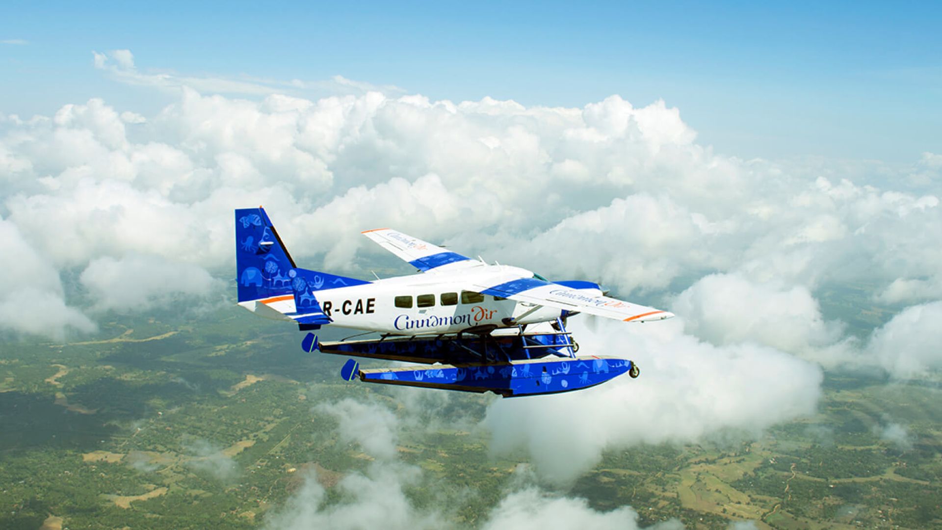 Cinnamon air seaplane in the sky