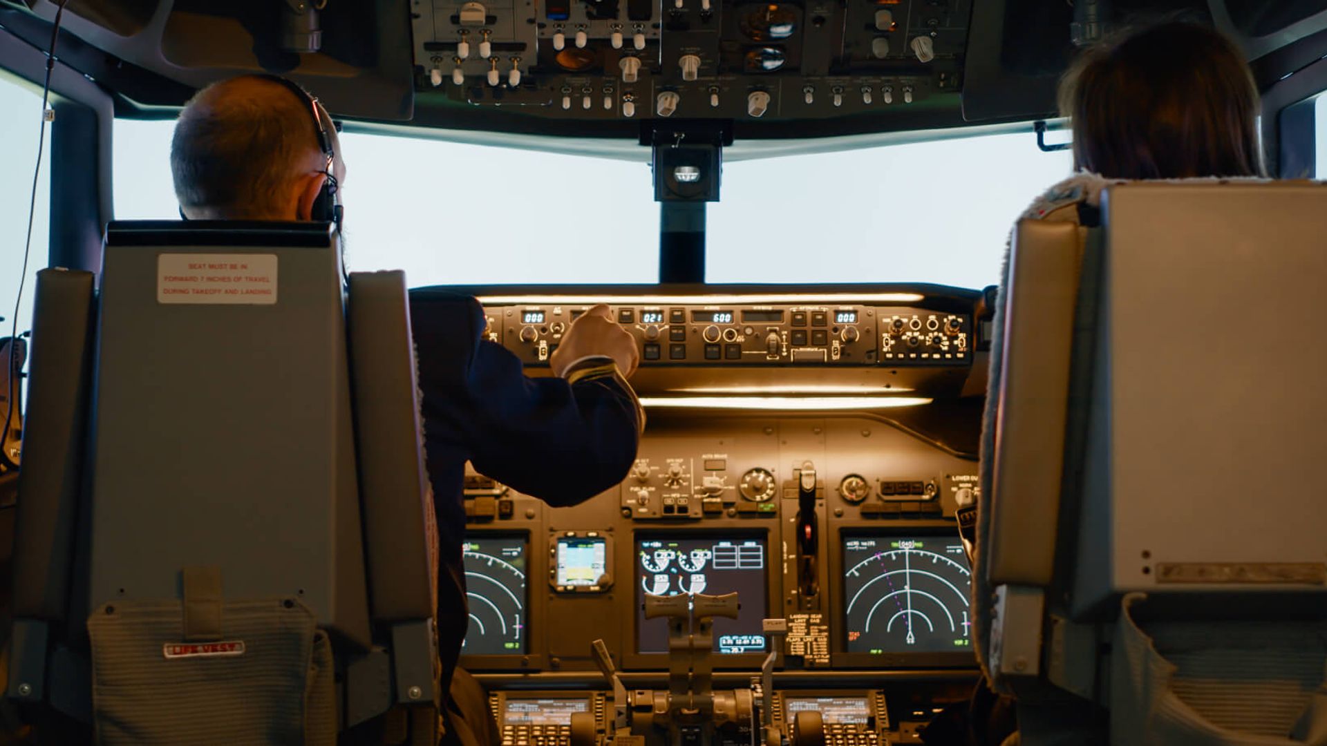 Pilots in the cockpit of a Cinnamon Air aircraft