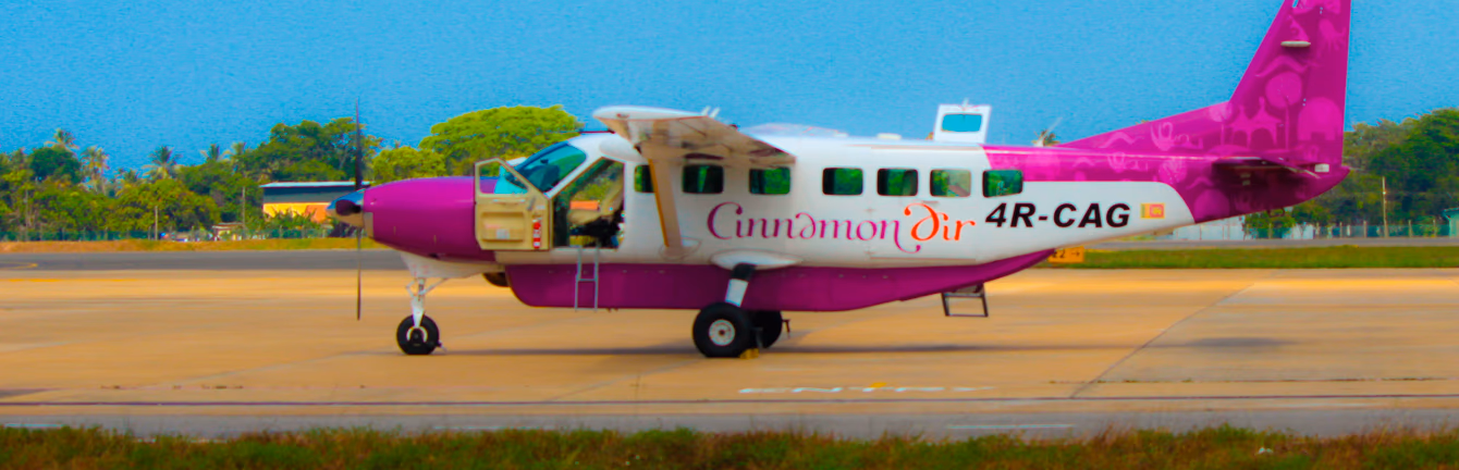 Cinnamon Air airplane at an international airport in Sri Lanka